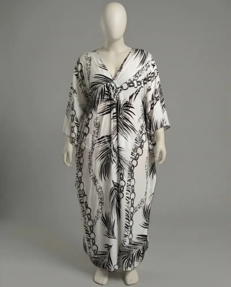 Біла пляжна туніка-максі з тропічним принтом