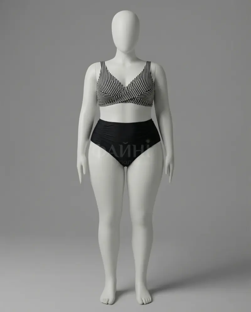 Манекен у смугастому купальнику.