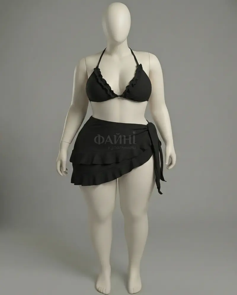 Чорний купальник з спідницею на манекені