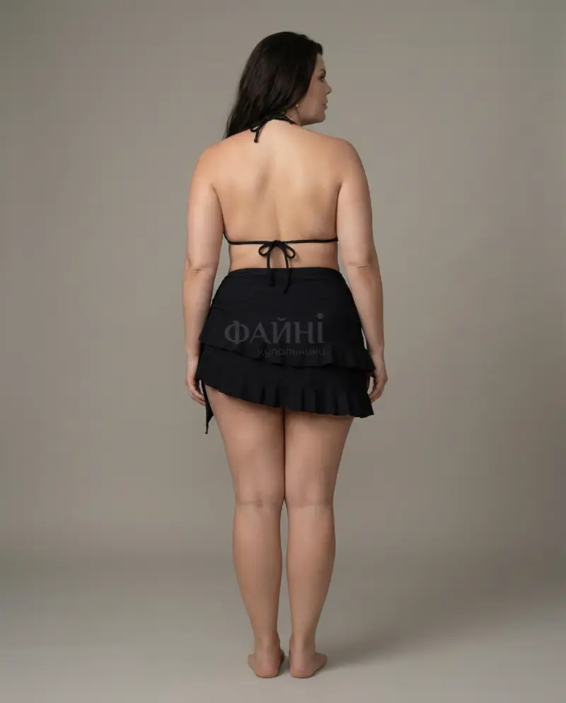Woman in plus size swimwear, back view