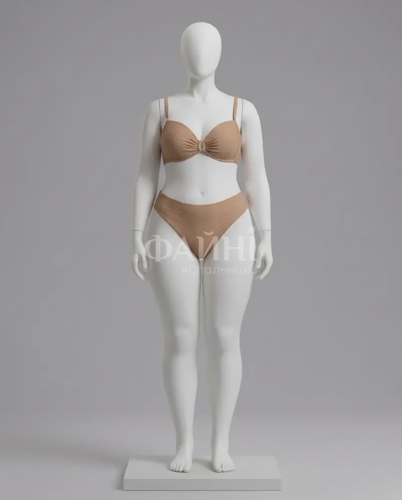 Бежевий купальник у рубчик на манекені