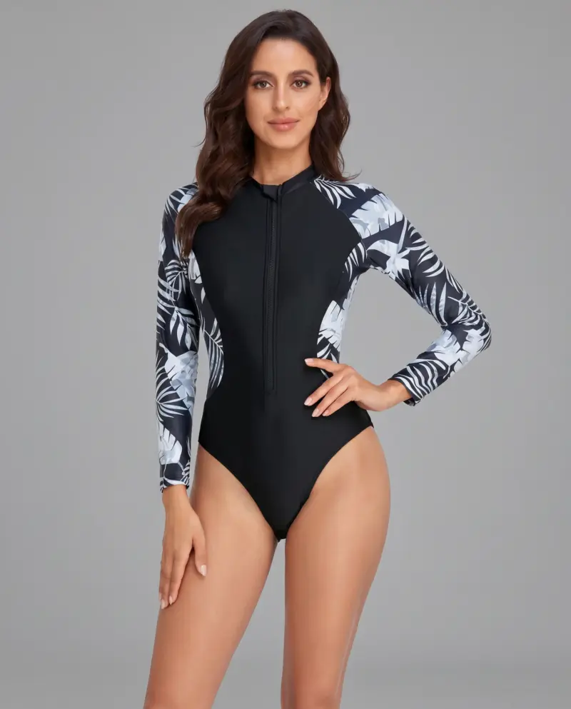 Kupalniki_com_ua 428 10 V4 Model in black and white leaf-print swimsuit